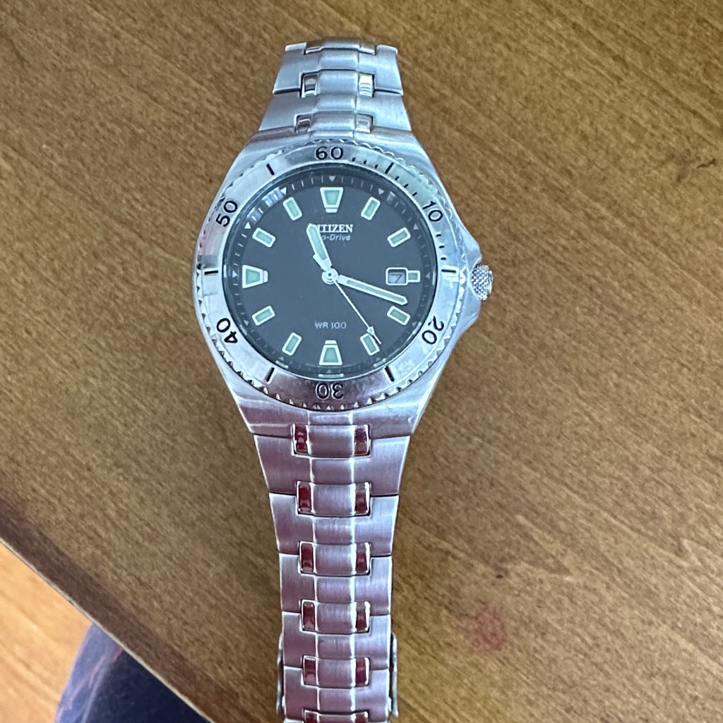 Citizen Silver Timepiece With Dark Dial